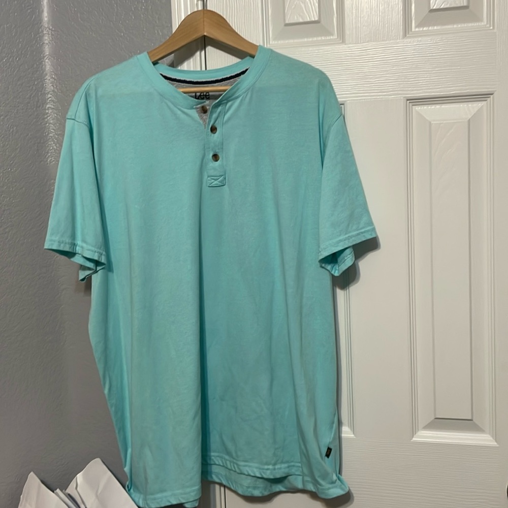 Light blue tee shirt.